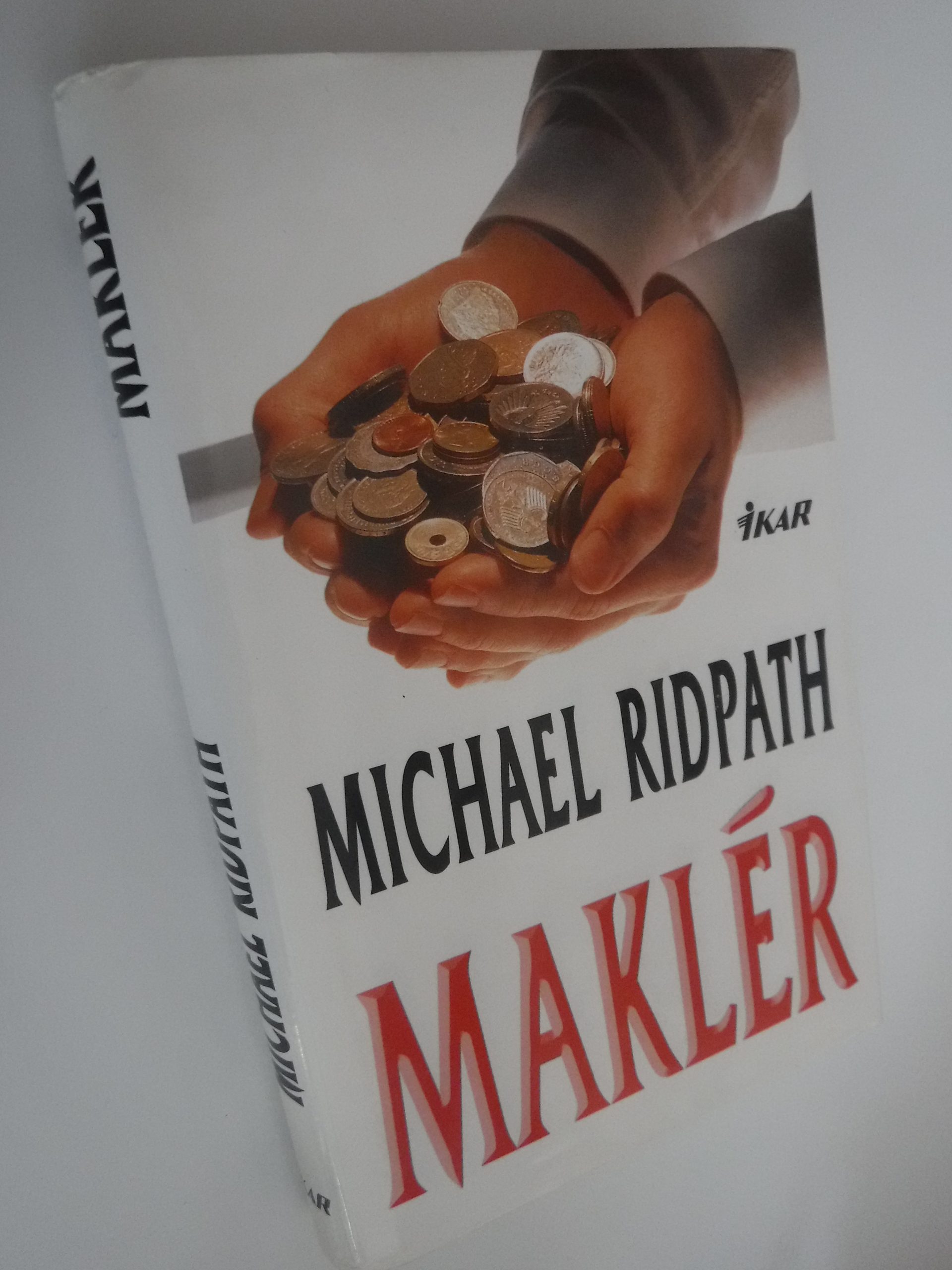 Maklér